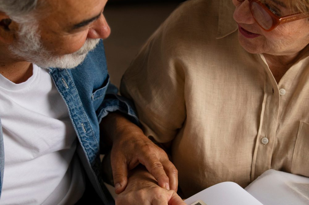 people-looking-picture-album-scaled-img